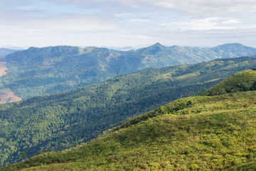 Fototapeta na wymiar 3 Green Tree Mountain with Warm Sun Light and Blue Sky Cloud at Phu Langka National Park Zoom 2