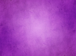 An elegant, rich purple, grunge parchment texture background with glowing center. 