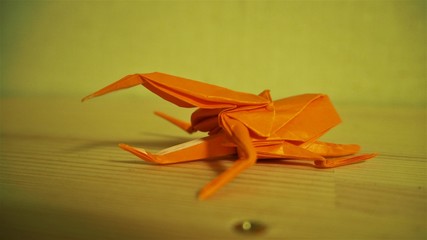 折り紙で作ったオレンジ色のヘラクレスオオカブト