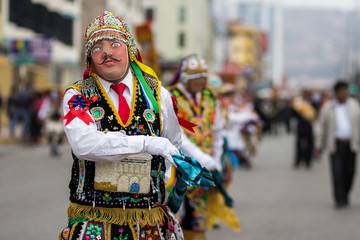 Dancers on the street in Corpus Christi fest at Cusco Peru