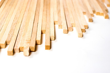 Balsa wood sticks background and texture