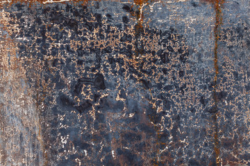 Background from an old cracked iron leaf with the ragged painted surface