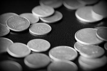 American cents on a dark background close up. Black amd white