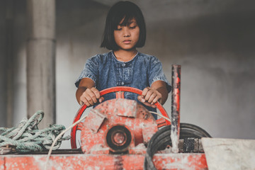 Children working at construction site for world day against child labour concept: