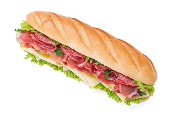 Tasty fresh baguette sandwich with ham, cheese and lettuce isolated on white background.