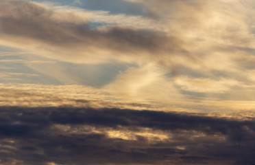 Clouds in the sky at sunset as a background