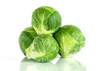 The Fresh green brussel sprouts vegetable on white background