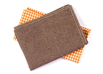 crumpled orange brown checkered napkin table clothes  on white background.