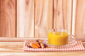 a cup of Turmeric Tea , Benefits for reduce Inflammation , Liver Detox and Cleanser healthy herb drink concept