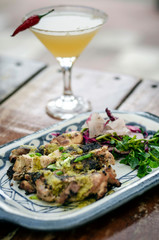 roast chicken with garlic and coriander sauce and pickled vegetables salad