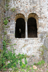 Fototapeta na wymiar Arch window in abandoned medieval church, Mystras, Greece