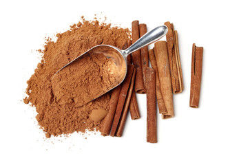 Cinnamon Sticks and Ground Cinnamon on a white background