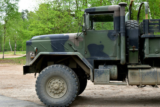 Old military vehicle.Camouflage painted.Military cars.Military transport.