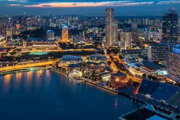 Fototapeta na wymiar Singapore Skyline. Singapore`s business district, blue sky and night view for marina bay