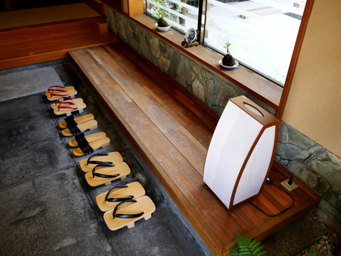 Geta Japanese traditional shoes sets with wooden seat in Kinosaki Onsen, Hyogo, Japan