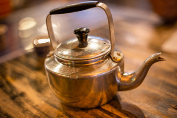 The Time of Tea Break with tea pot and tea cup on wooden table.