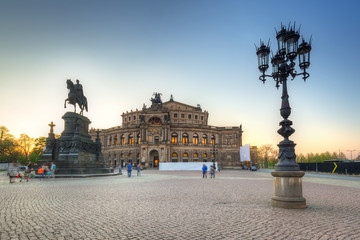 Fototapeta na wymiar Semperoper Opera and King John of Saxony monument at sunset, Dresden. Germany