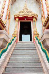 Fototapeta na wymiar High stair in Buddhist temple in Asia, Thailand