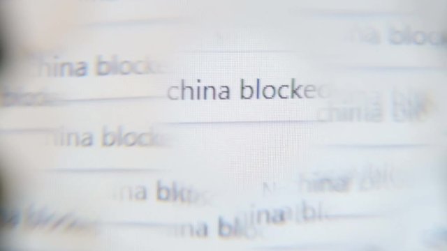 Abstract moving background. China blocked. The inscription on the computer screen in the style of a kaleidoscope. Blocking online resources and news concept.