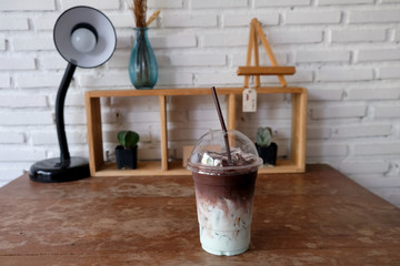 Iced chocolate or cacao with milk and mint syrup