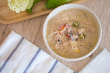 Minced crab in coconut milk served with fresh vegetable (Thai food)