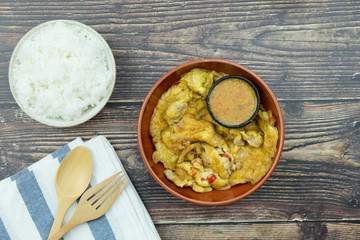 Omelet with spicy chilli sauce