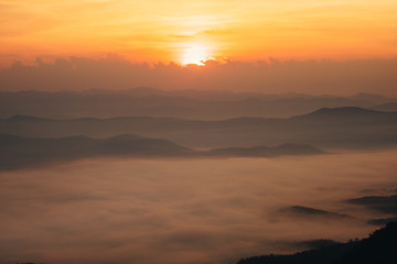 Fototapeta na wymiar Dawn of Sea Fog on the top of the Sierra at Doi Samer Dao, Nan, Thailand 