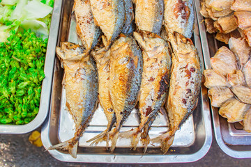 Fried mackerel at market's street in Thailand.