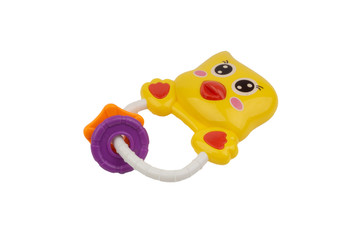 Rattle toy or baby toy closeup on white background. Selective focus