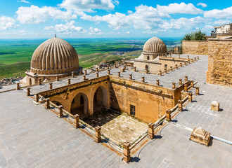Mardin City in Turkey. Zinciriye Madrasah with Mardin old town and Mesopotamia view. .