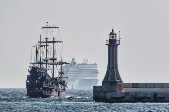ON THE PORT ROADSTEAD - Beautiful cruise ships at the sign navigating the entrance to the sea port in Gdynia