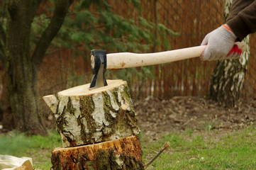 Chopping wood with axe