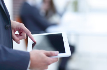 closeup.businessman with tablet computer