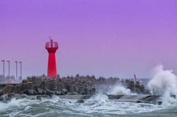 STORM AT SEA - Storm waves crashing on the breakwater in the port of Kolobrzeg