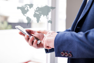 businessman organizing travel from the mobile phone