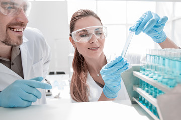 Fototapeta premium two scientists doing tests in the laboratory.