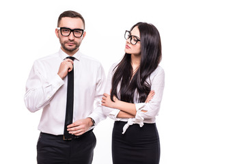 Concept of partnership in business. Young man and woman standing back-to-back with crossed hands against white background