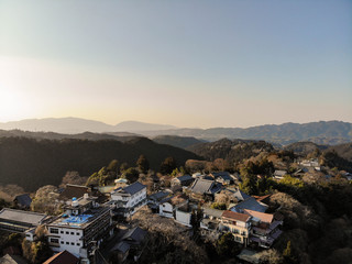 Sun begins to set over small Japanese village in the mountains