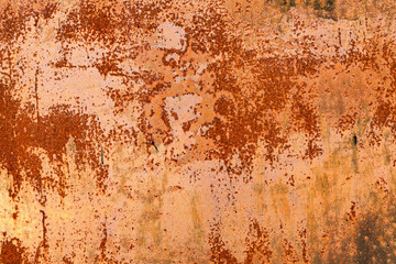 Bright red-orange iron sheet. Rust compound is an iron oxide. Deep rust, oxide and corrosion texture on a metal surface.