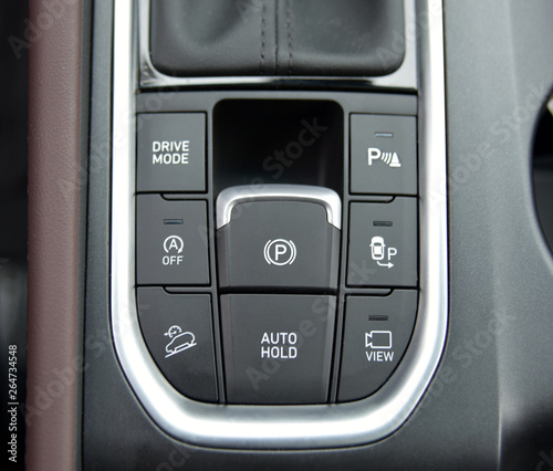 panel with buttons on the control panel of car