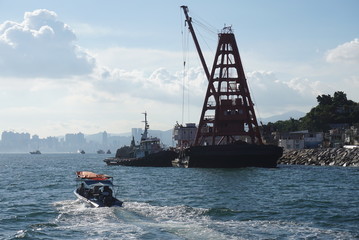 crane ship in the harbour for sea construction