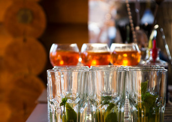 glasses of orange alcohol cocktail