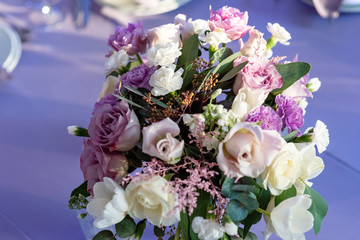 Wedding composition on a dining table for guests