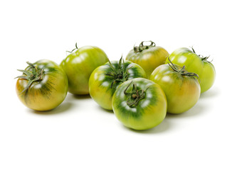 fresh green tomato isolated on white background