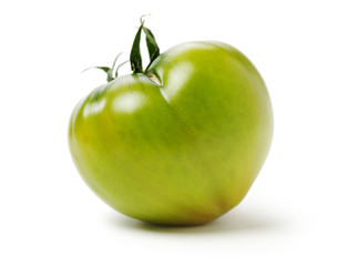 fresh green tomato isolated on white background