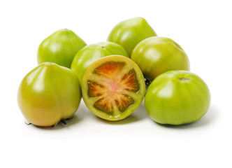 fresh green tomato isolated on white background