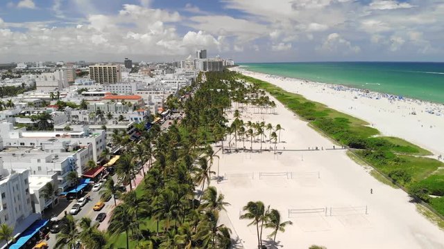 2018-08-04 - Miami - USA 10 x2 50fps 200Mbps Long Aerial shot of the South Beach, Miami, US - Lummus Park with volleyball court , Ocean Drive and beach 