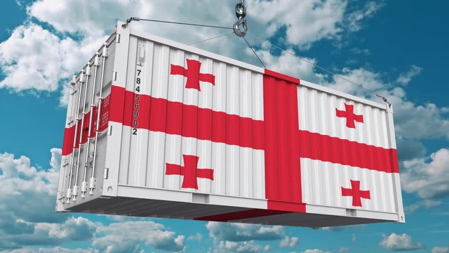 Cargo container with flag of Georgia. Georgian import or export related conceptual 3D animation