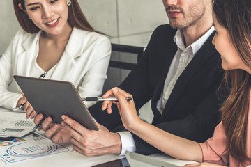 Businessman is in meeting discussion with colleague businesswomen in modern workplace office....