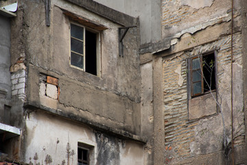 Fototapeta na wymiar Abandoned house and old commercial buildings in old town area at Shantou downtown or Swatow city in Guangdong, China